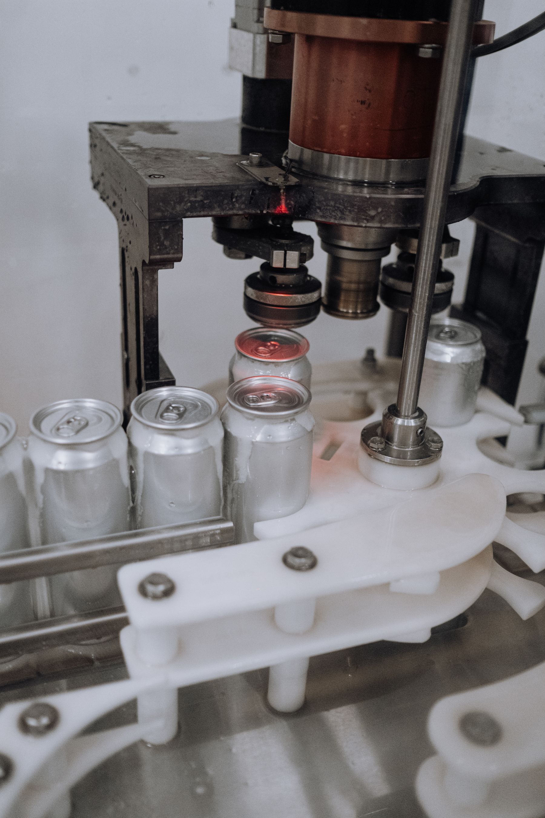 Beverage cans on a canning line, stock application image